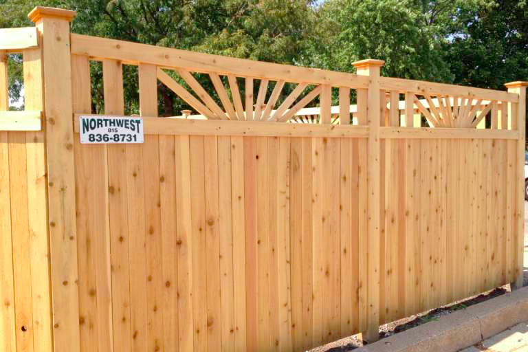 privacy cedar fence with design at top