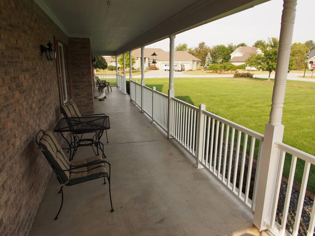 Install vinyl porch railing around Fort Wayne