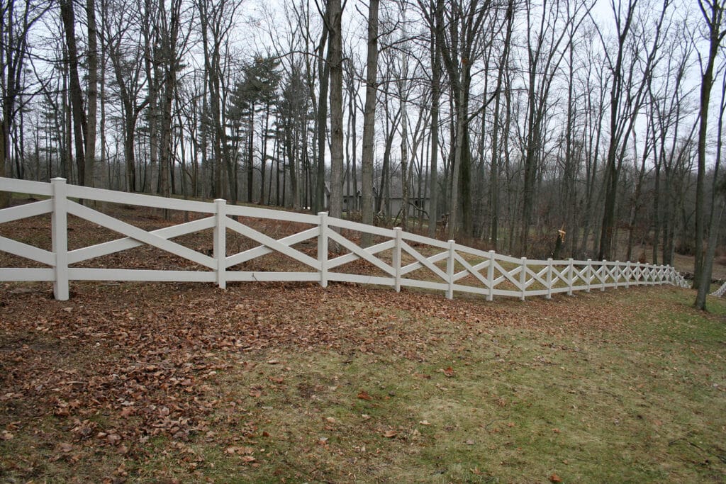 Vinyl rail fence installation around Fort Wayne