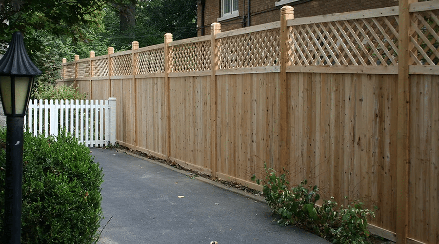 Install a cedar fence with lattice top in Fort Wayne, IN