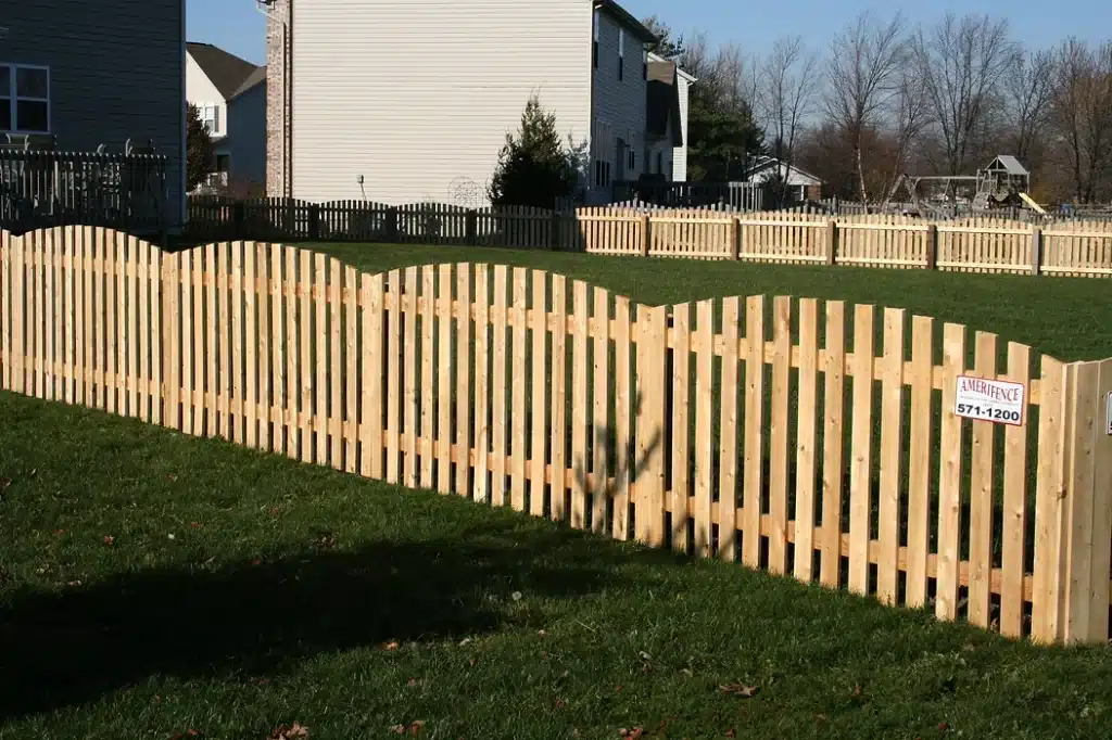 Bow top picket fence installation around Fort Wayne