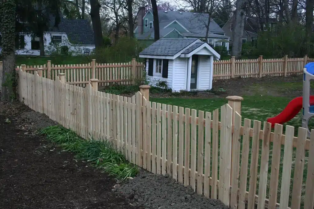 Custom cedar picket fence installation services around Fort Wayne