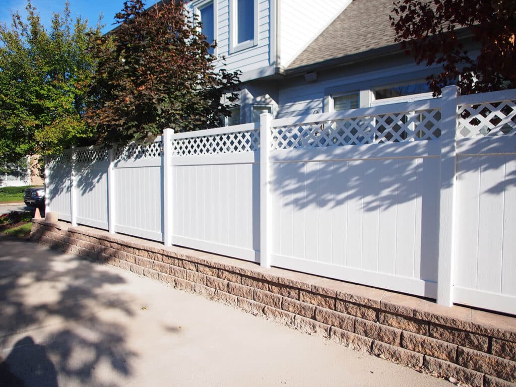 Install a vinyl fence with lattice-top around Fort Wayne