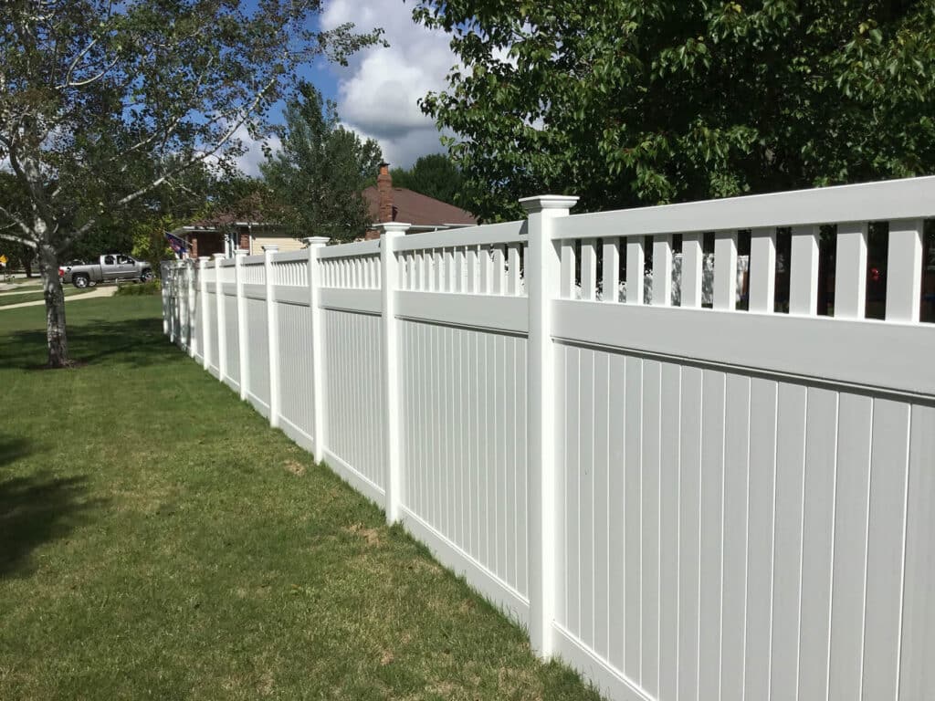 lattice-topped white vinyl fence installation in Fort Wayne