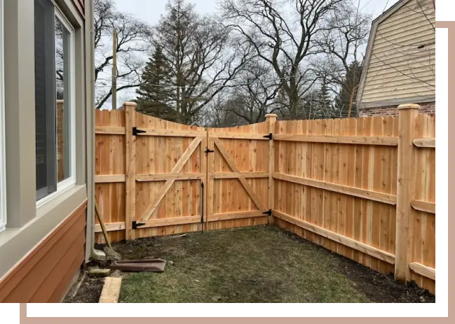 cedar fence with gate and black hinges