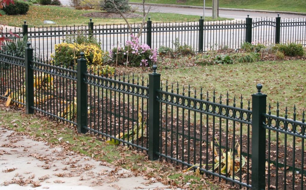 Custom metal fence installation around Fort Wayne, IN