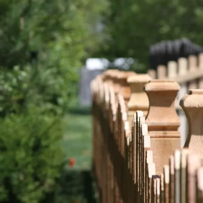 a row of fence post caps